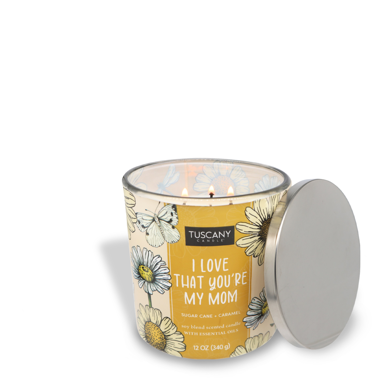 A Tuscany Candle® SEASONAL scented candle in a glass jar with floral designs and the message "i love that you're my mom" on it, accompanied by a silver lid.