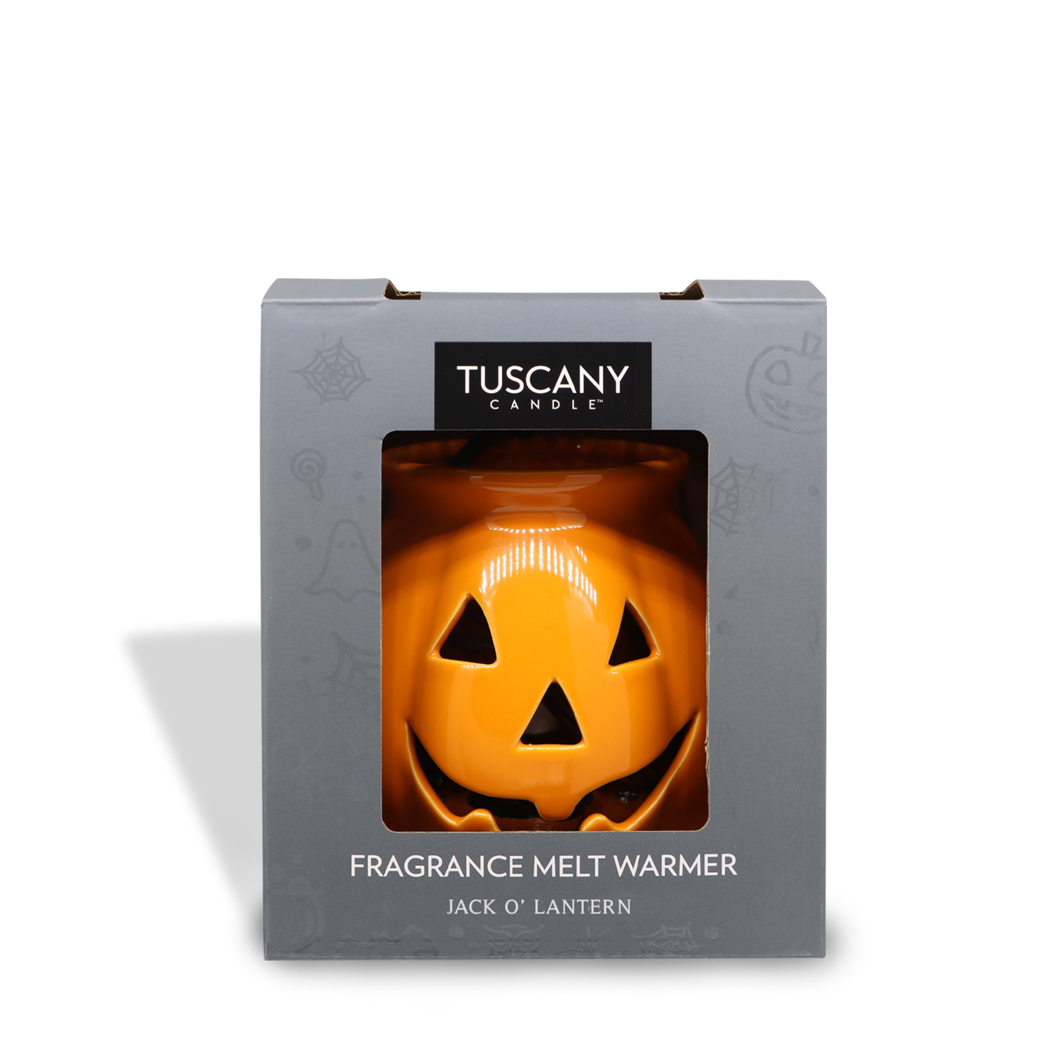 A Tuscany Candle® SEASONAL Jack O' Lantern Wax Melt Warmer in a gray box with a clear window displaying the pumpkin-shaped warmer, powered by a low wattage light bulb.