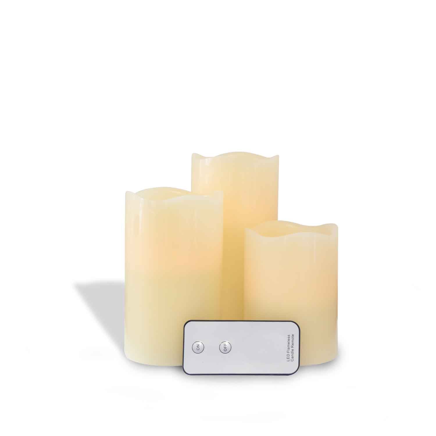 Three Tuscany Candle 3-Piece White LED Flameless Candle Sets with remote control on a white background.