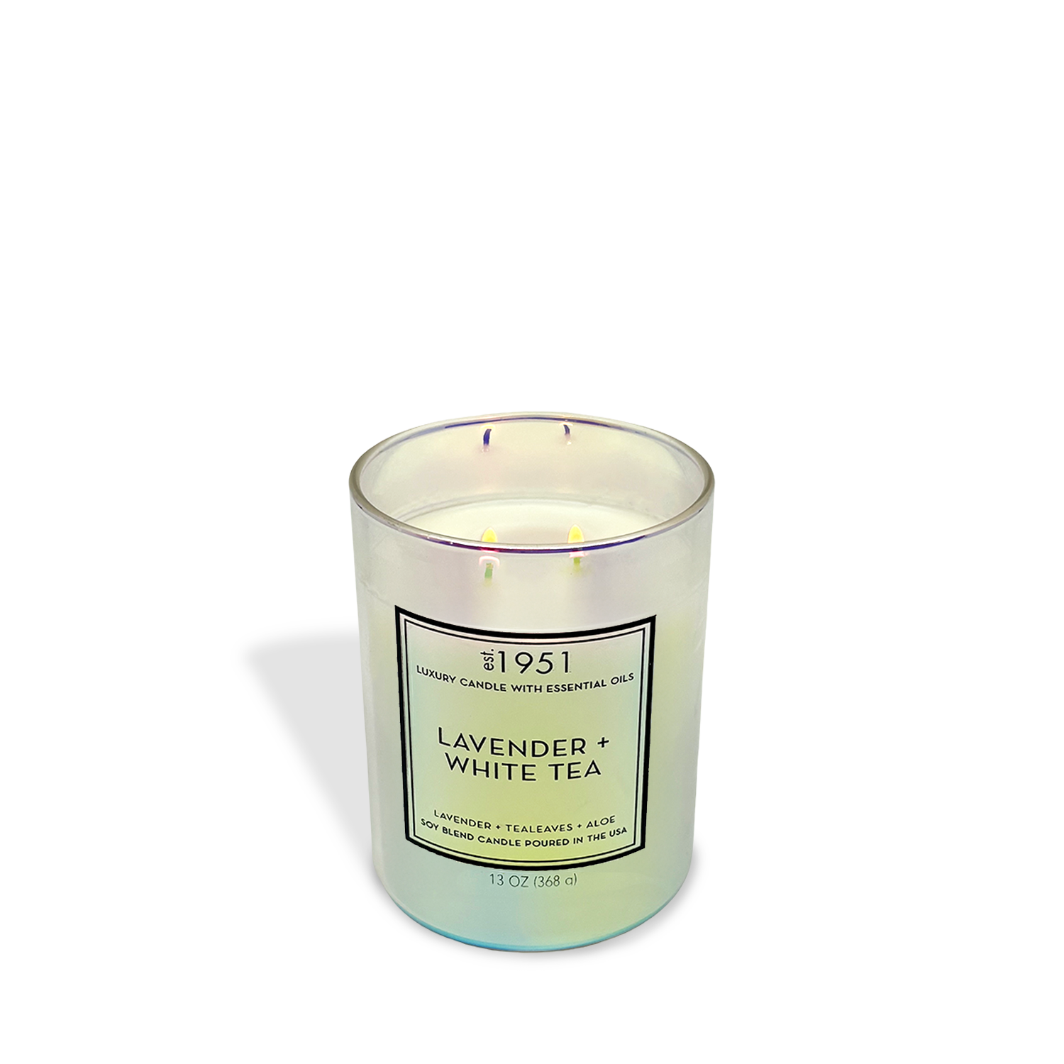 The est.1951 Lavender + White Tea (13oz) candle fills your room with a calming aroma, displayed in a labeled glass jar featuring three wicks against a clean white background.