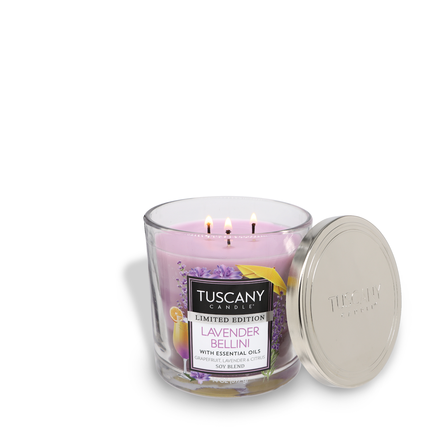 A lit three-wick Lavender Bellini long-lasting scented jar candle (14 oz) with a silver lid to the side.