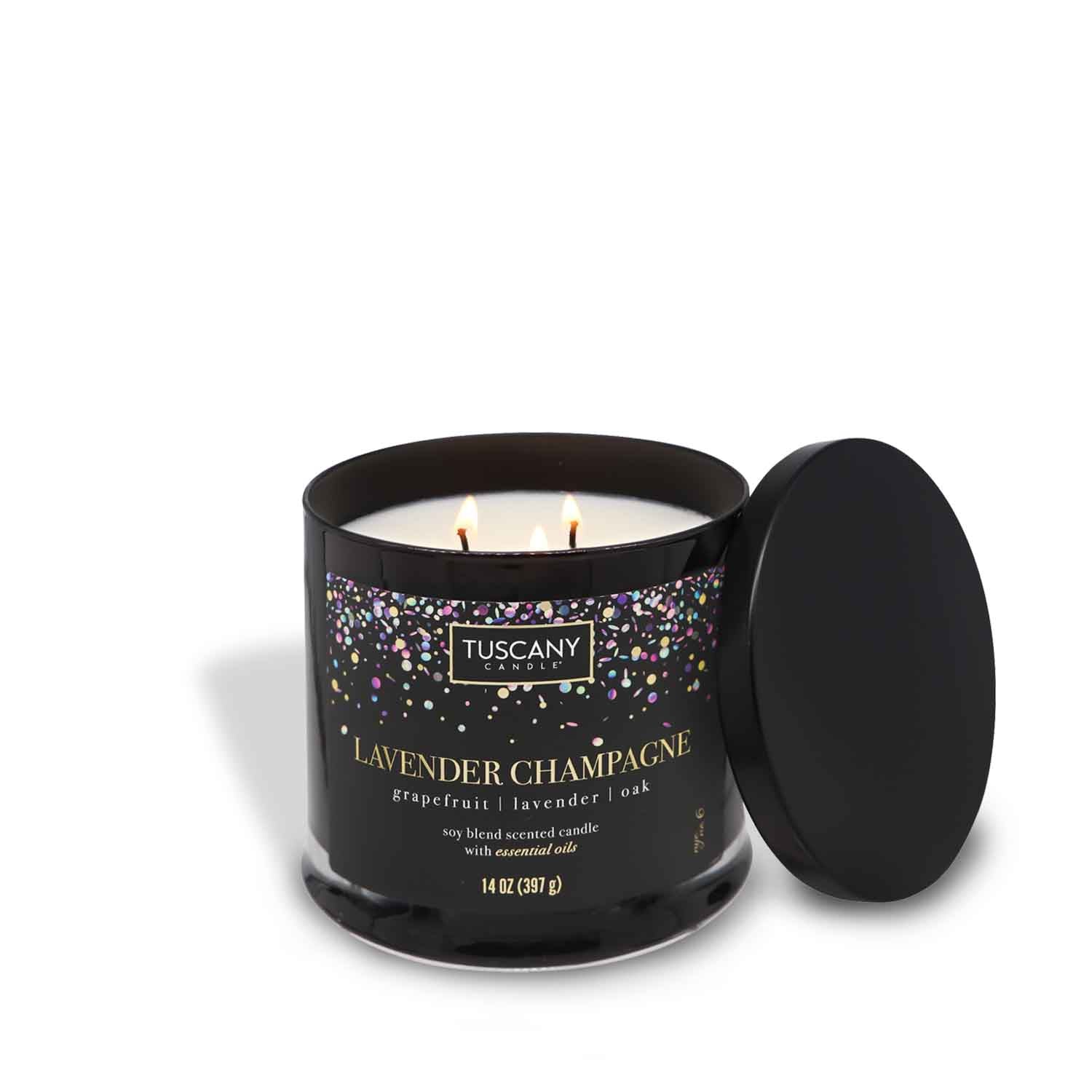 A Lavender Champagne Scented Jar Candle (15 oz) – Celebrations Collection by Tuscany Candle in a black tin with confetti, evoking a winter calm.