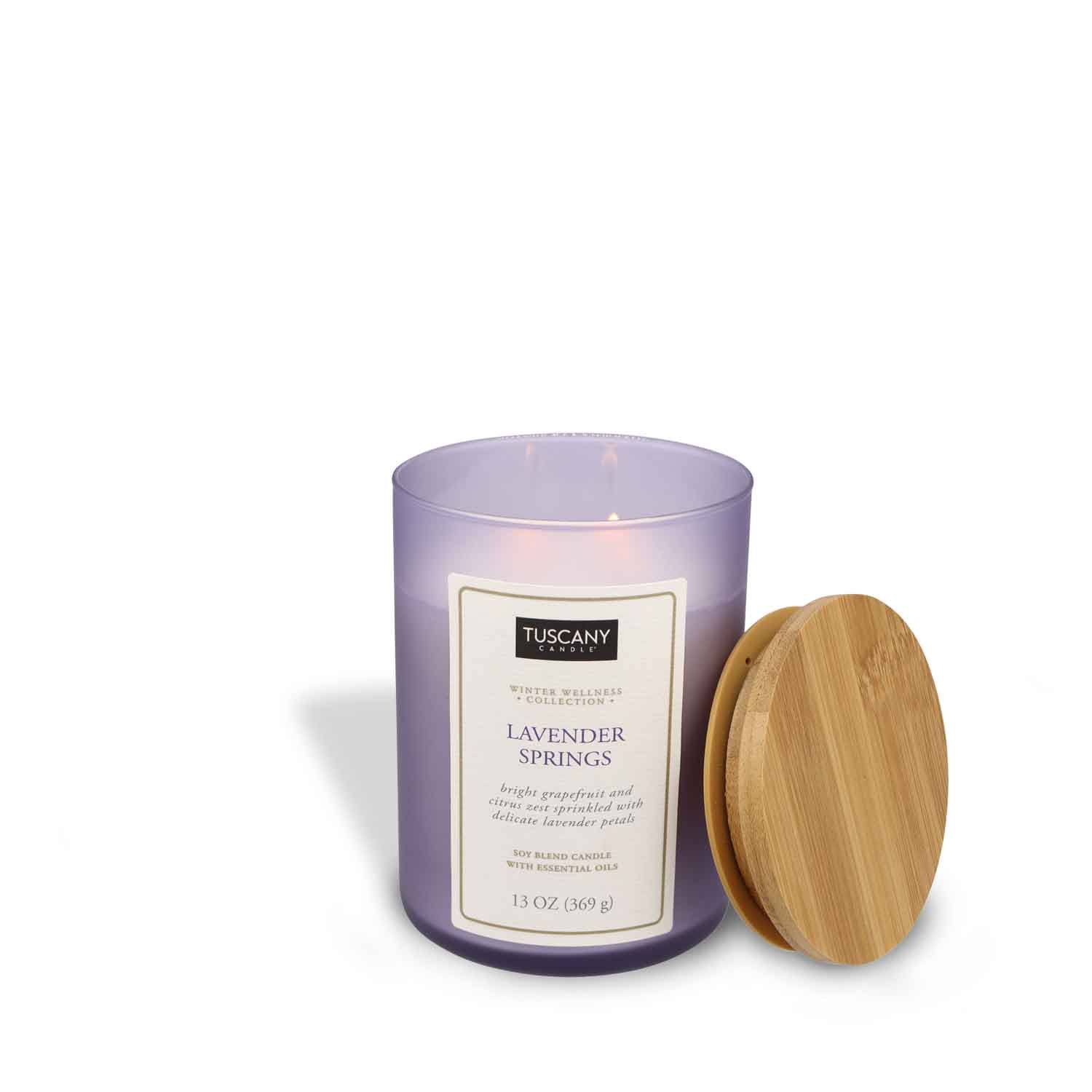 Lavender Springs candle from the Winter Wellness Aromatherapy collection, showcasing pure white wax in a colored matte-finish jar, accented with a chic paper label.