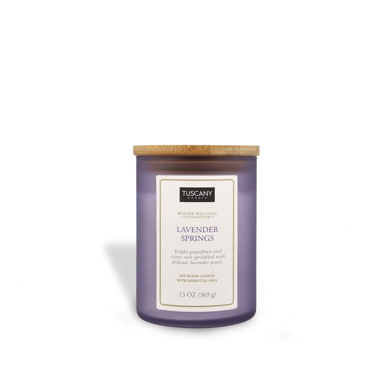 Lavender Springs candle from the Winter Wellness Aromatherapy collection, showcasing pure white wax in a colored matte-finish jar, accented with a chic paper label.