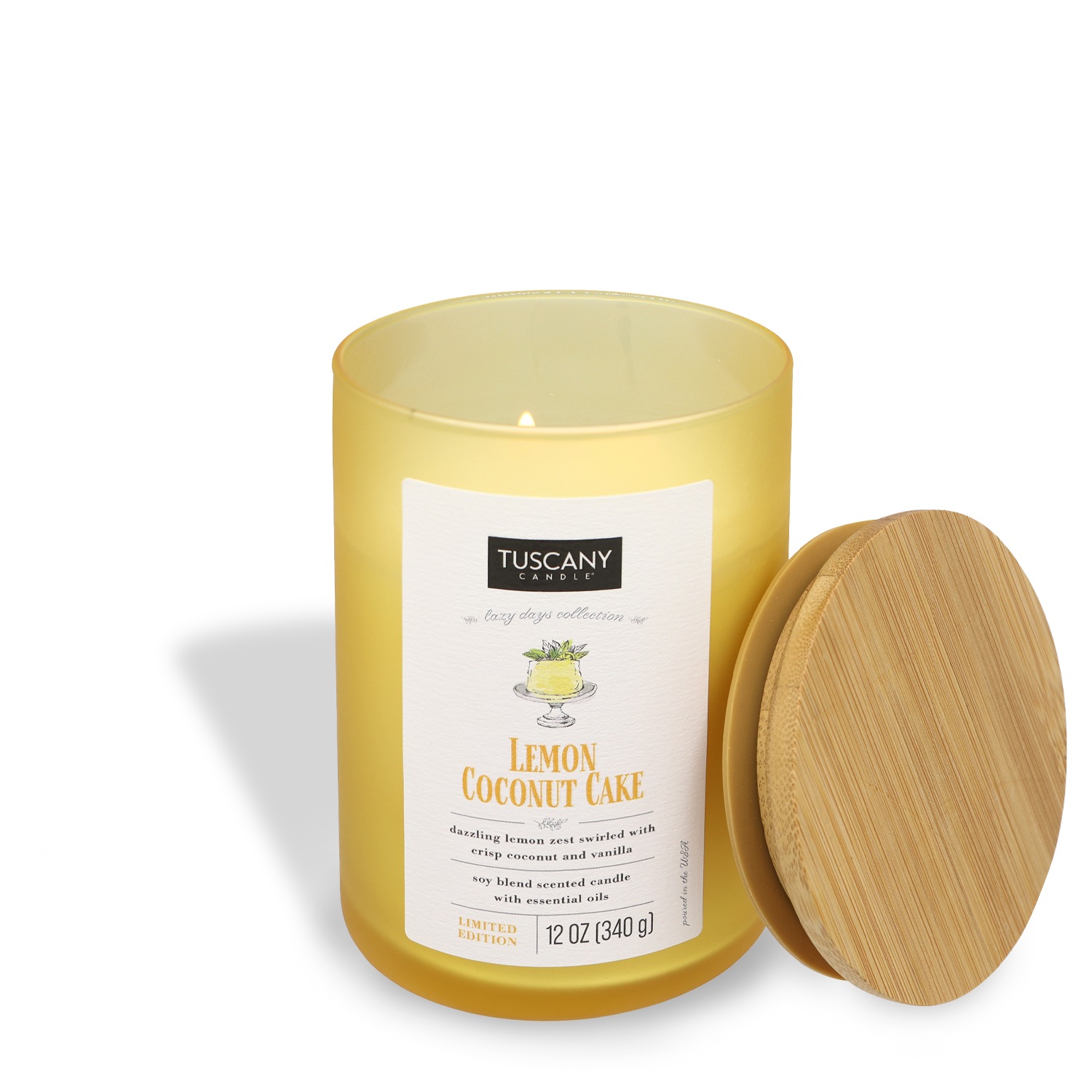 A Lemon Coconut Cake (12 oz) scented candle with a wooden lid from the Tuscany Candle® SEASONAL.