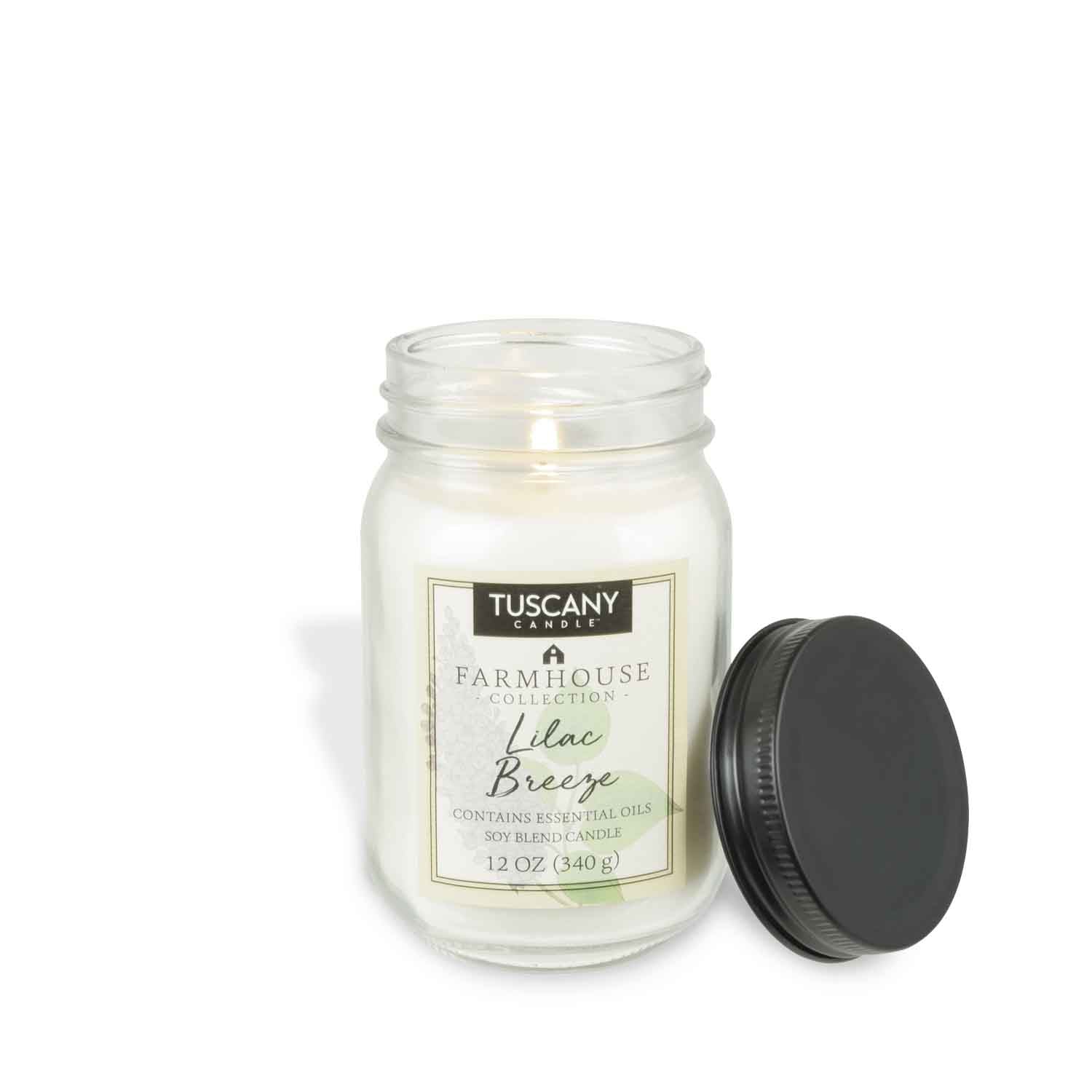 A Lilac Breeze Scented Jar Candle (12 oz) from the Farmhouse Collection, sealed with a lid – Tuscany Candle® EVD.