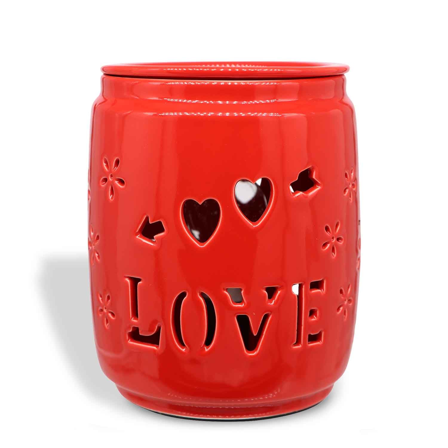 A red Tuscany Candle® SEASONAL Love Wax Melt Warmer with the word love on it.