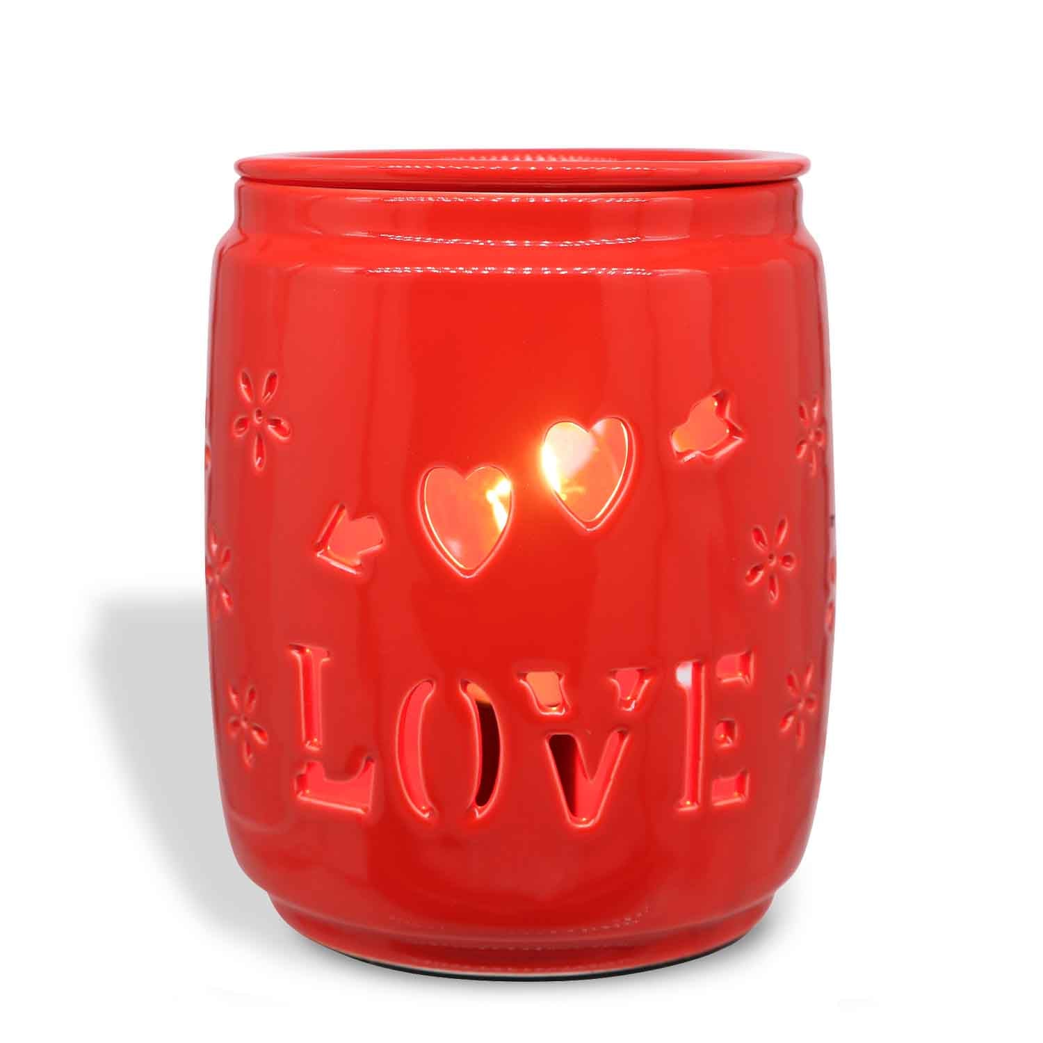 This Tuscany Candle® SEASONAL Love Wax Melt Warmer has the word "love" engraved on it.