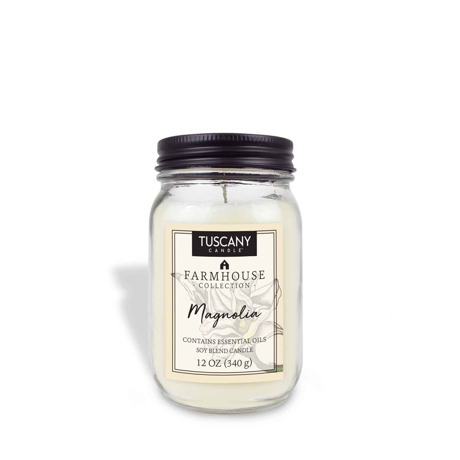 Clear mason jar candle with black lid, containing a 12oz scented candle named 'Magnolia' from our Farmhouse collection.