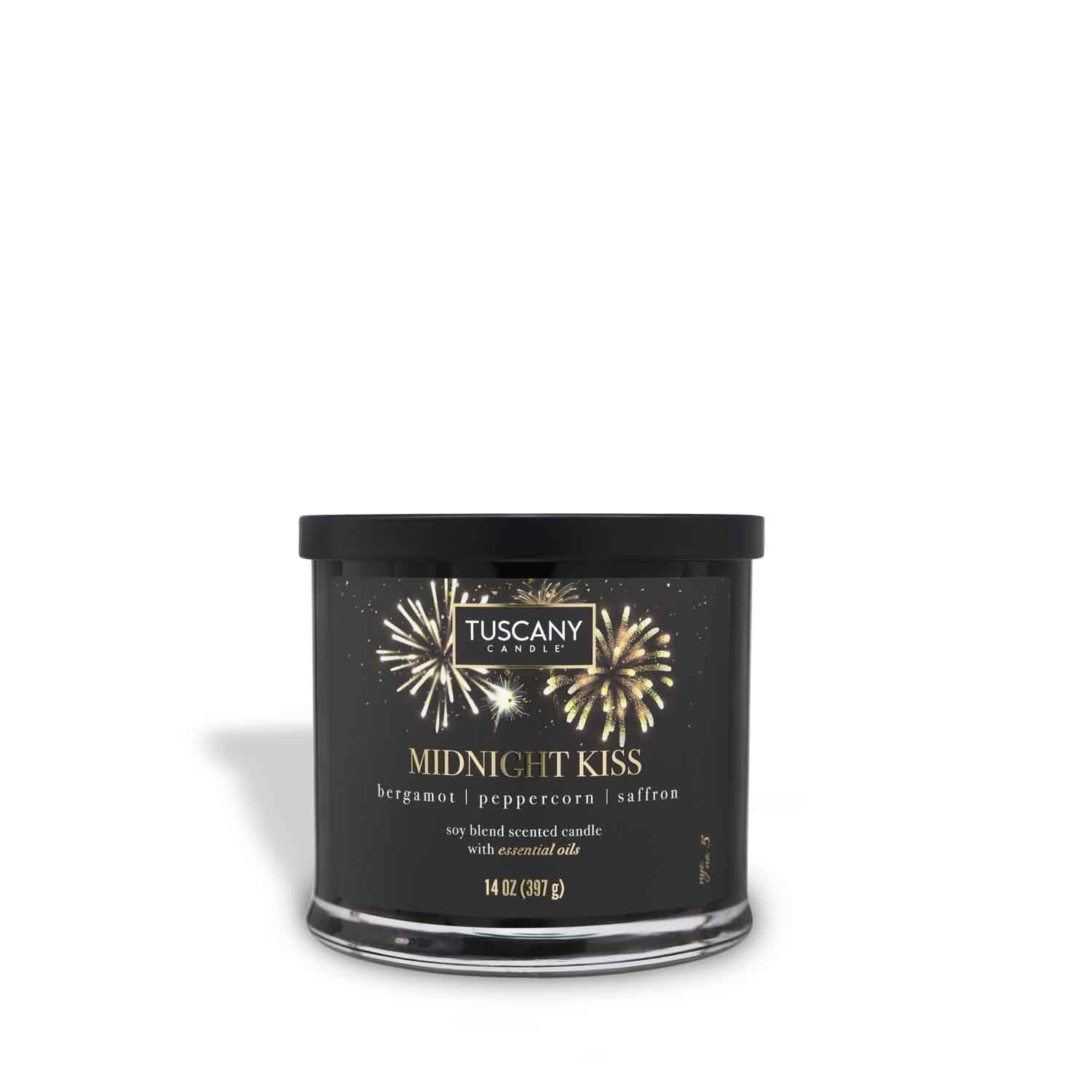 Elegant 'Midnight Kiss' candle in its glossy black jar, radiating the luxurious scents of Bergamot, Pink Peppercorn, and Saffron, complemented by a chic New Year's Eve label.