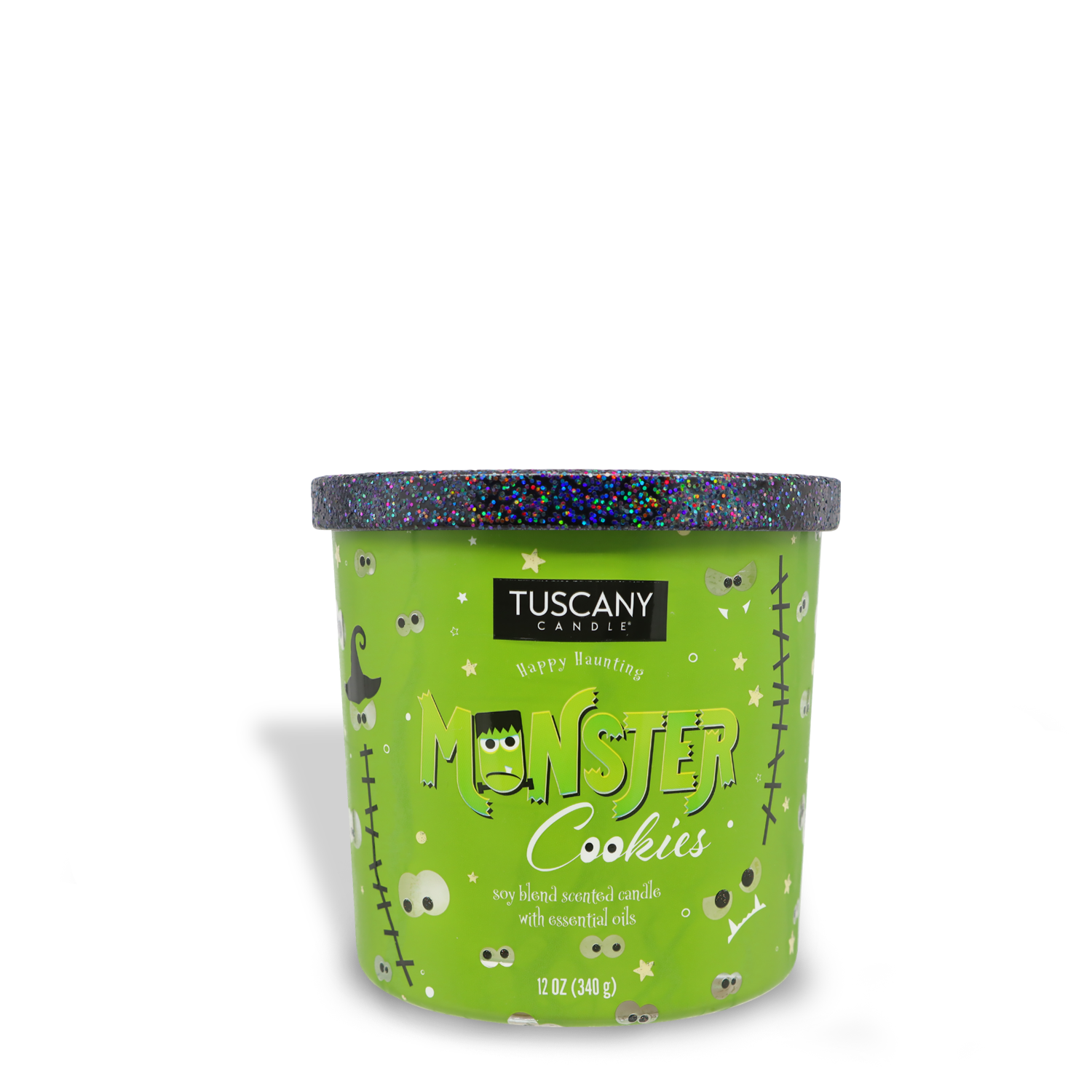 A green Tuscany Candle® SEASONAL Monster Cookies Long-Lasting Scented Jar Candle (12 oz) with a black glittery lid. The label reads "Monster Cookies" and features cartoon monster designs, offering a playful touch to this premium satin wax creation.