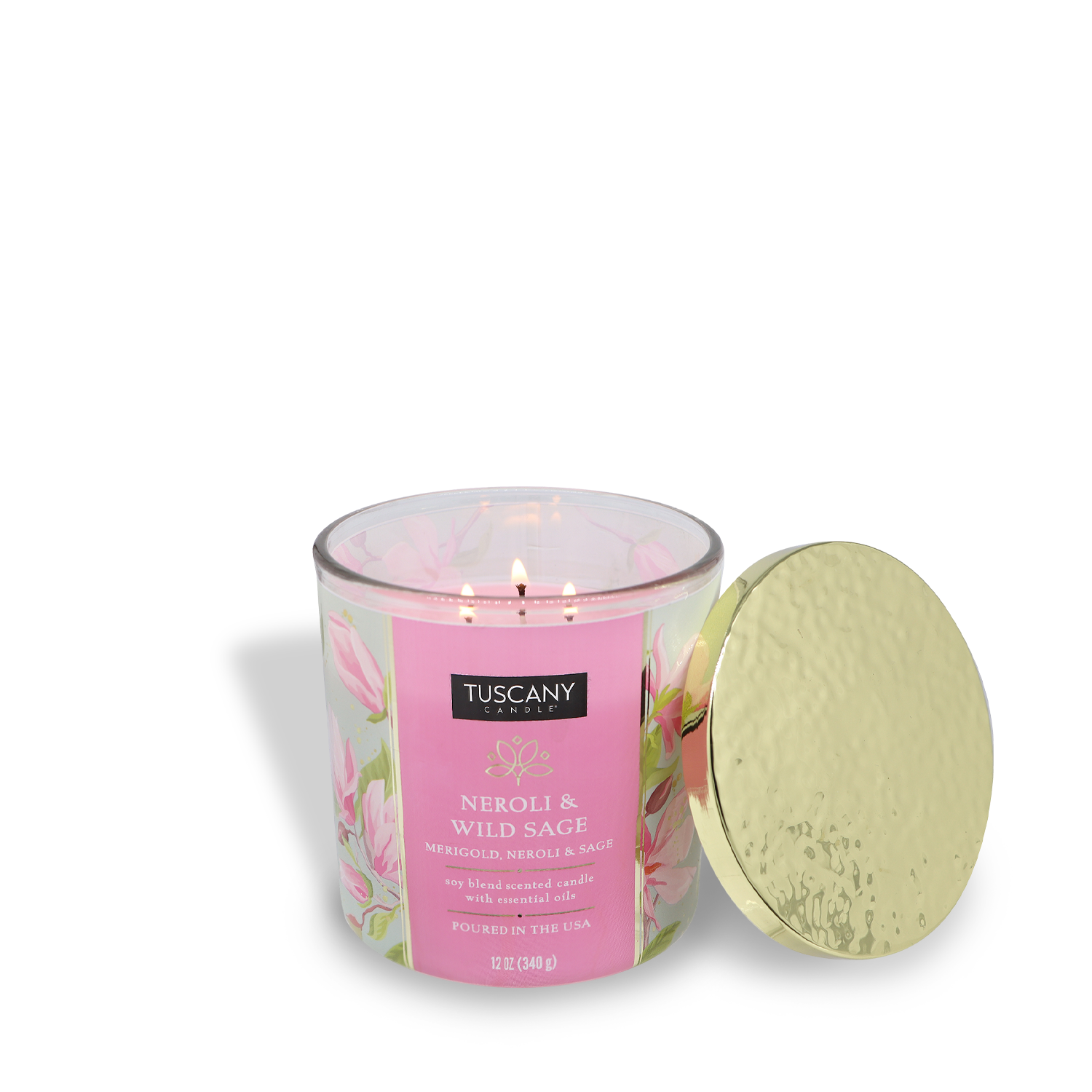 A lit Tuscany Candle® SEASONAL Neroli & Wild Sage: Marigold Scented Summer Candle (12 oz) from the Island Glam Collection, with three wicks and a floral glass design, sits beside a textured gold lid—bringing elegance to any space.