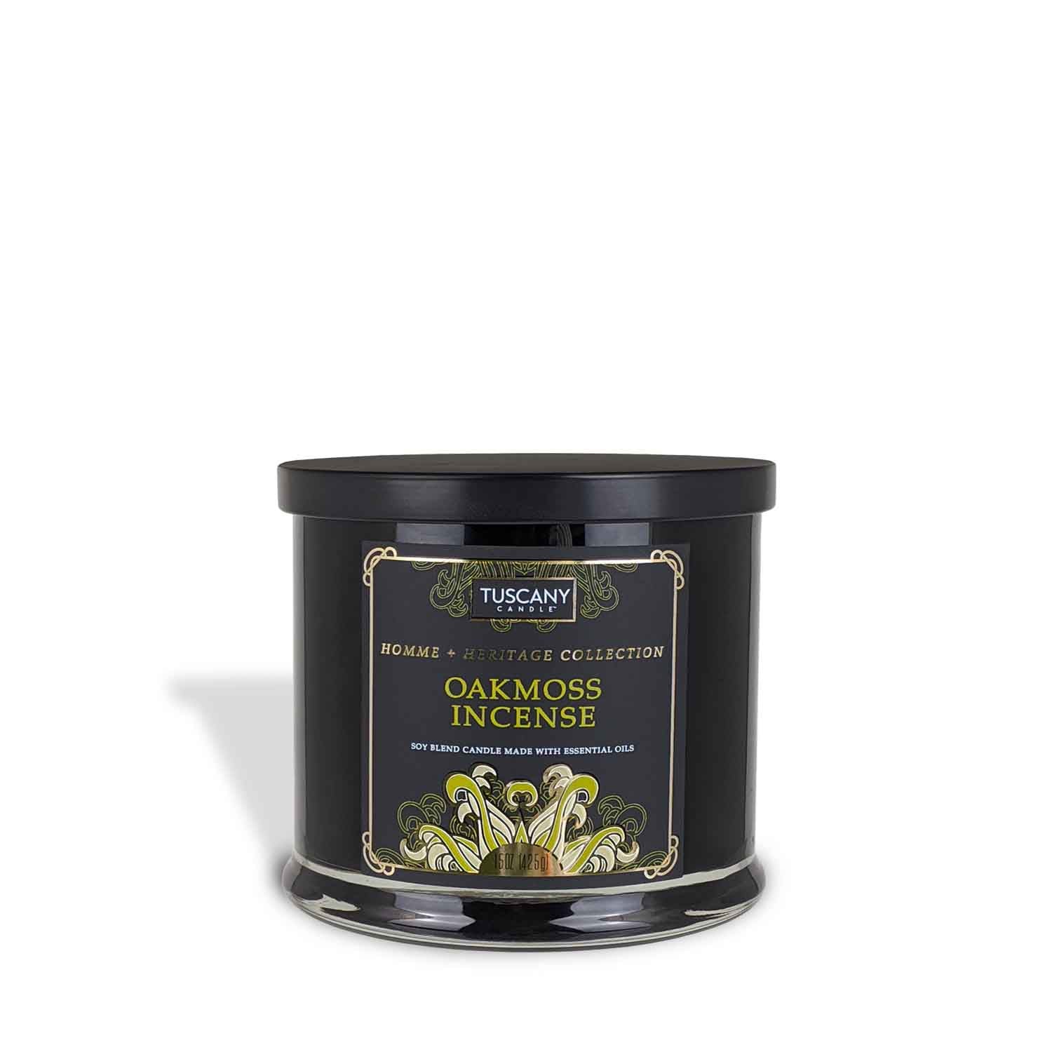 A black tin with an Oakmoss Incense Scented Jar Candle (15 oz) – Homme + Heritage Collection by Tuscany Candle in it.