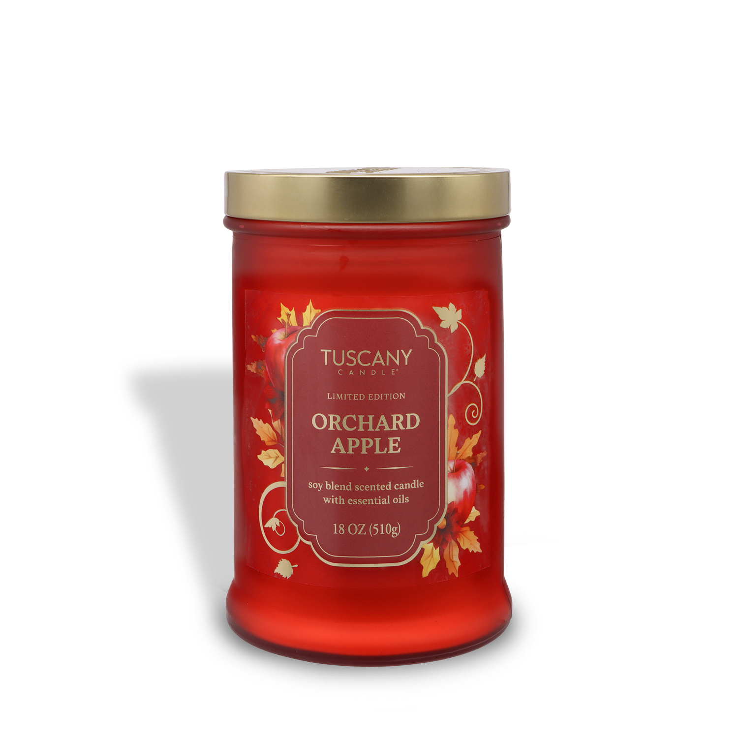 A red jar candle labeled "Tuscany Candle® SEASONAL Orchard Apple: Sweet Apple & Clove Scented Fall Candle (18 oz)," featuring a gold lid and autumn leaf design on the label.