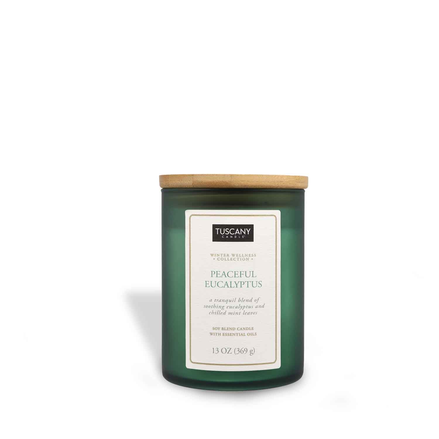 Peaceful Eucalyptus candle from the Winter Wellness Aromatherapy collection, elegantly encased in a matte-finish colored jar with its pure white wax highlighted by a modest paper label.