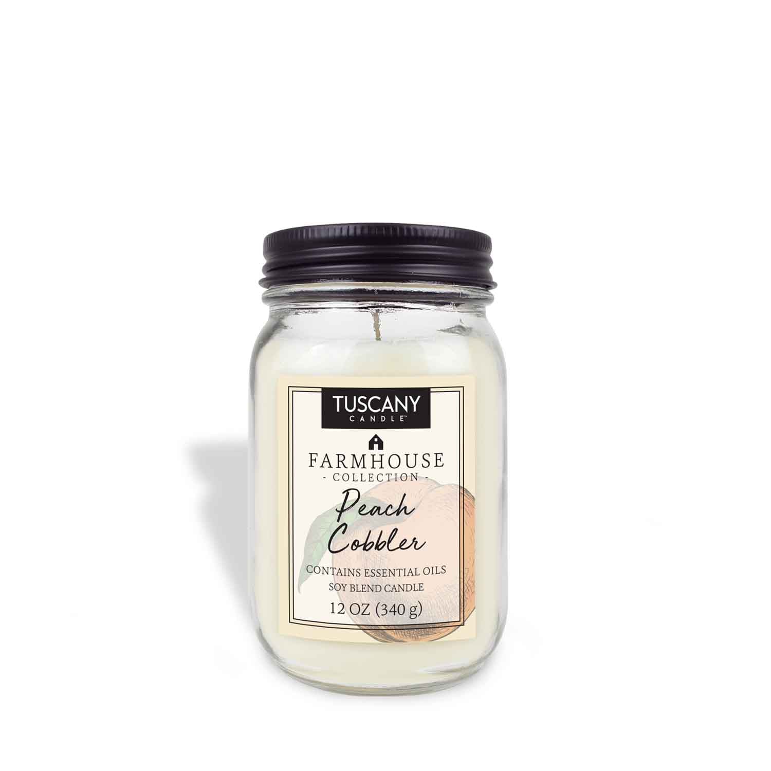 The Tuscany Candle® EVD Peach Cobbler Scented Jar Candle, part of the Farmhouse Collection, blends sun-kissed peaches with essential oils. This 12 oz delight, complete with a black lid, captures the essence of freshly baked treats.