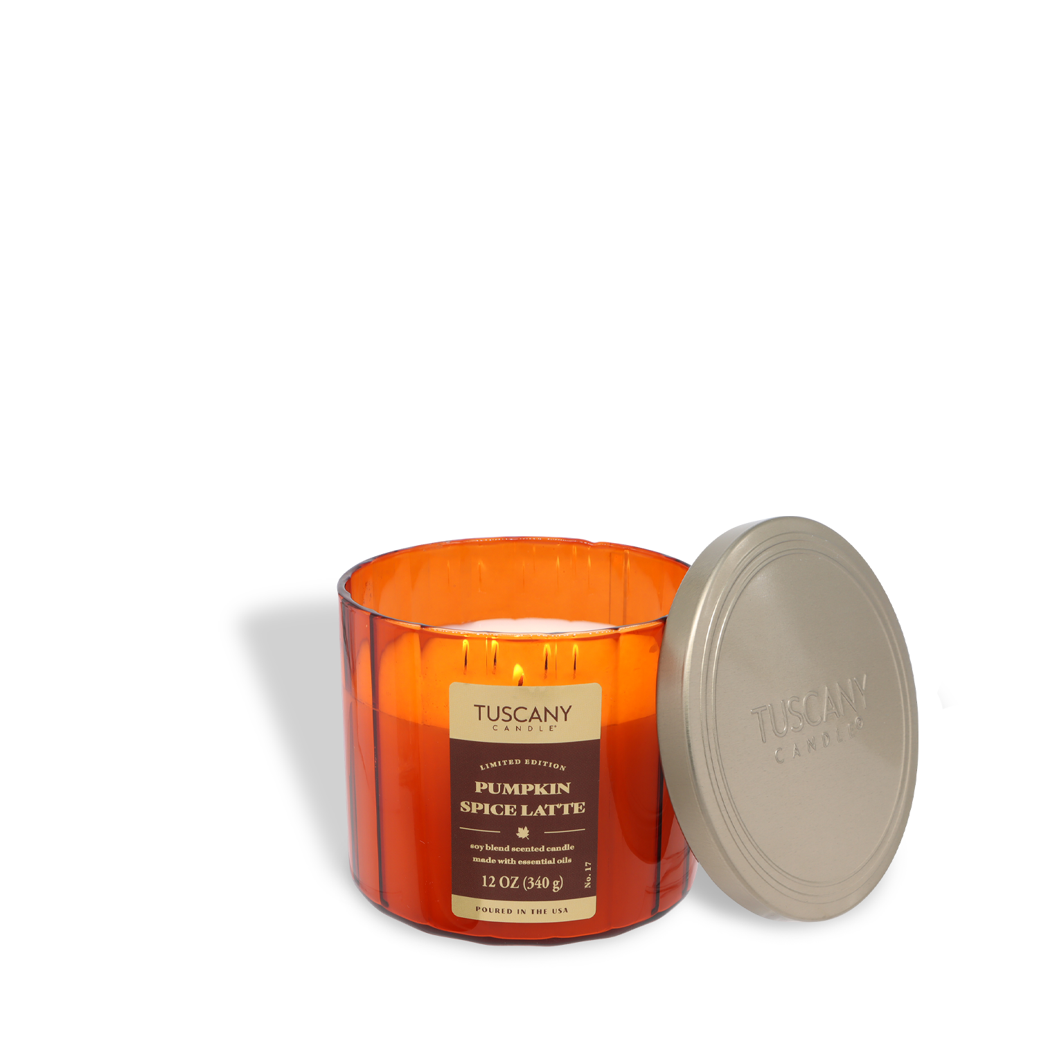 A Tuscany Candle® SEASONAL "Pumpkin Spice Latte: Oatmilk & Dark Roast" scented fall candle (12 oz, three wicks) is displayed with its silver lid set beside it.