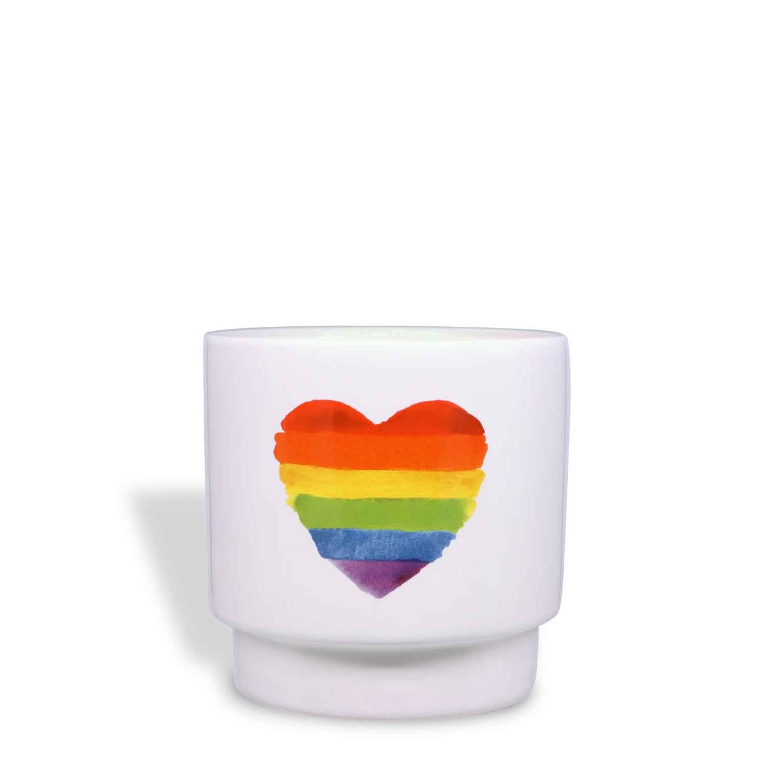 A white Tuscany Candle® SEASONAL mug with a Rainbow Heart Scented Ceramic Candle (10 oz) – Pride Collection design.