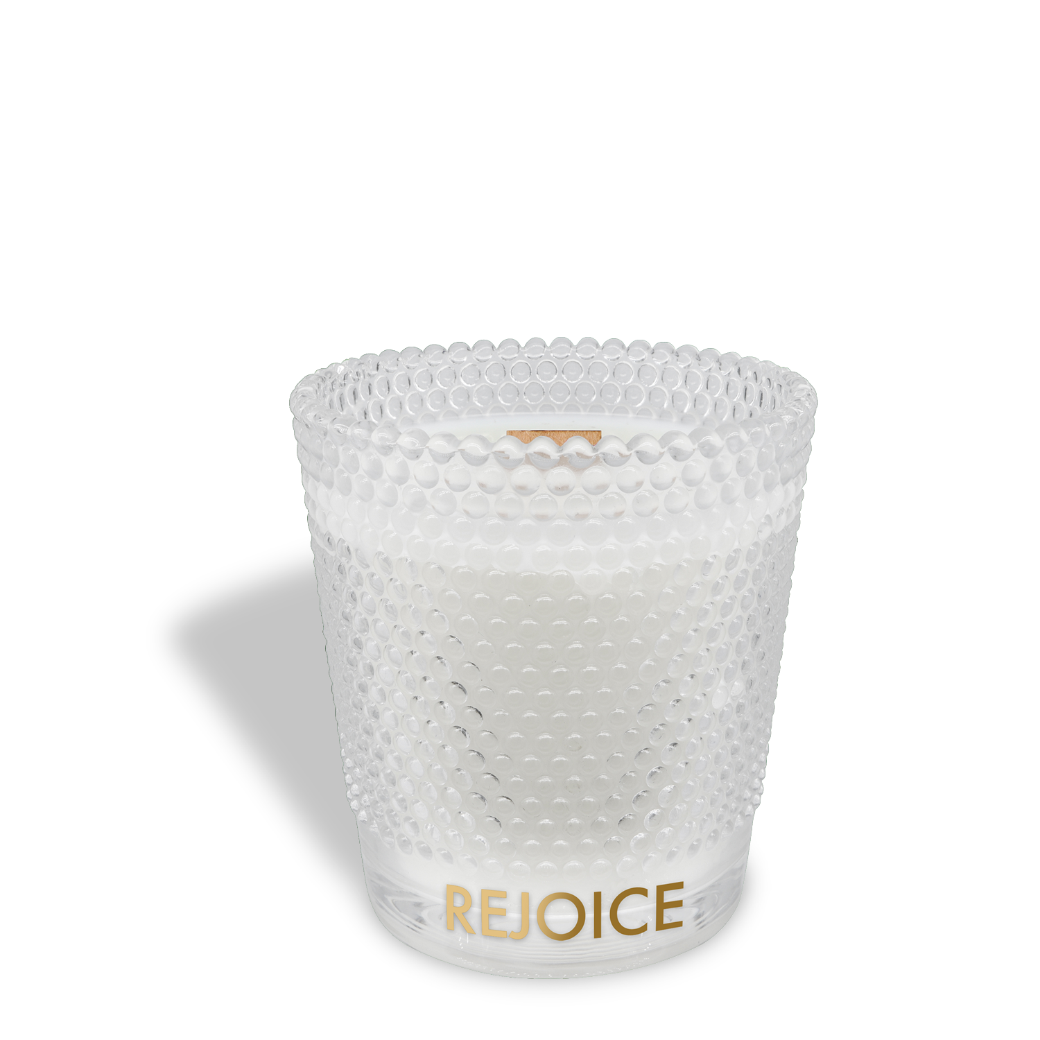 The Rejoice: Peppermint & Vanilla Scented Holiday Wooden Wick Candle (13 oz) by Tuscany Candle® SEASONAL features a white candle in a textured, clear glass holder with "REJOICE" gold lettering on the front.