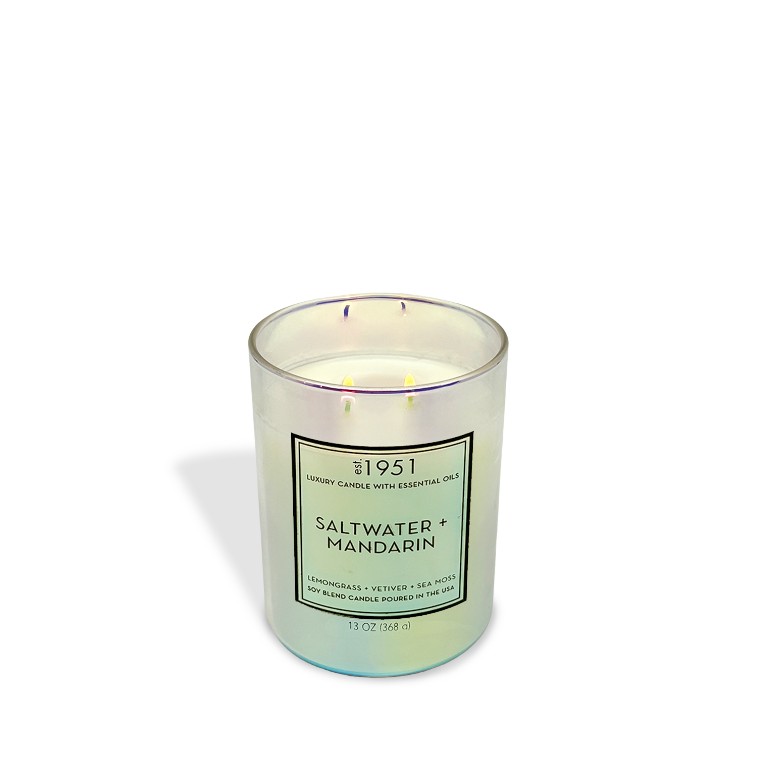 The est.1951 Saltwater + Mandarin (13oz) luxury candle features three wicks and essential oils, blending lemongrass, vetiver, and sea moss for a relaxing coastal scent and ambiance.
