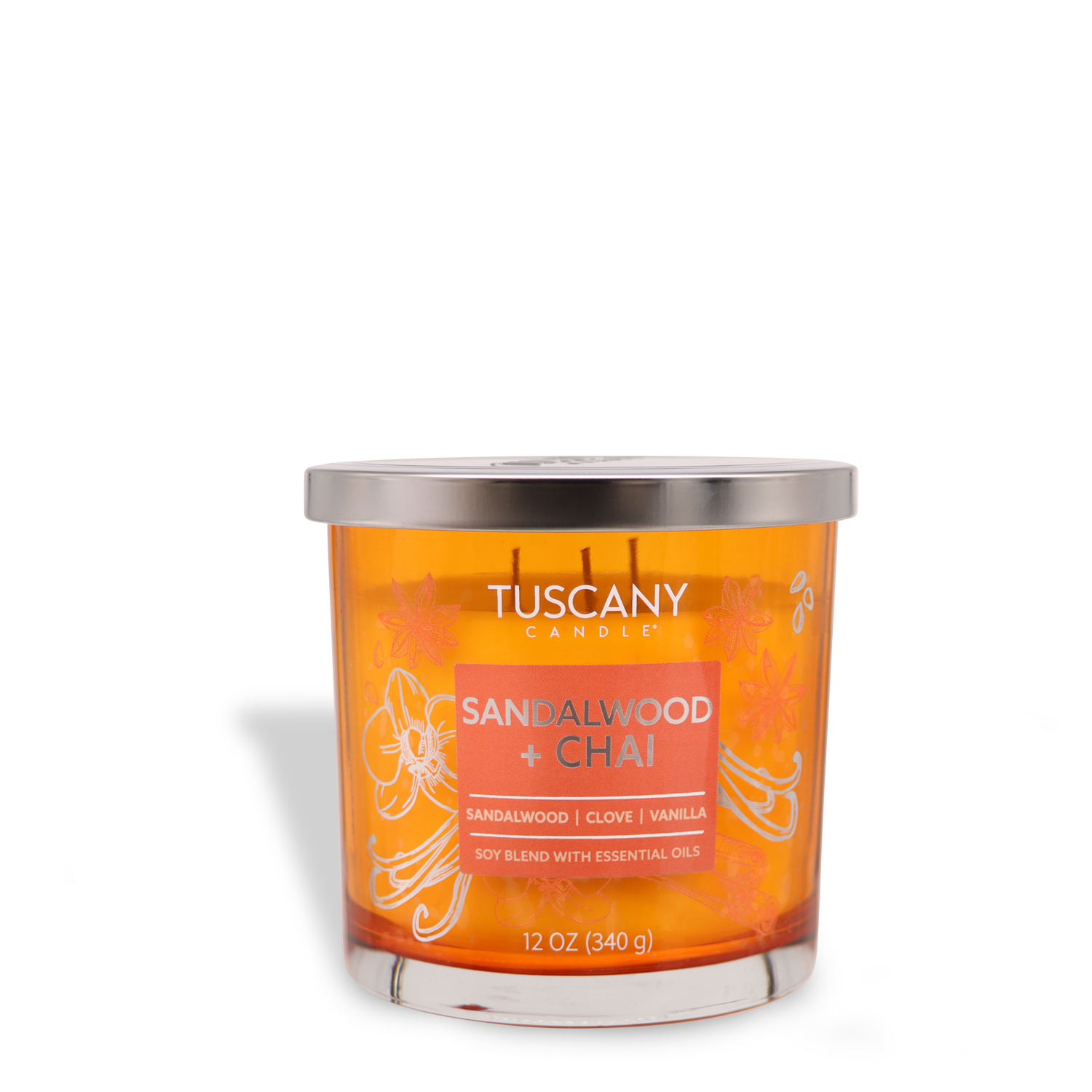 The 12 oz orange candle in a glass jar is labeled "Sandalwood + Chai: Vanilla Bean Scented Jar Candle" from the Tuscany Candle® EVD Painters' Palette Collection, featuring sandalwood, clove, and vanilla.