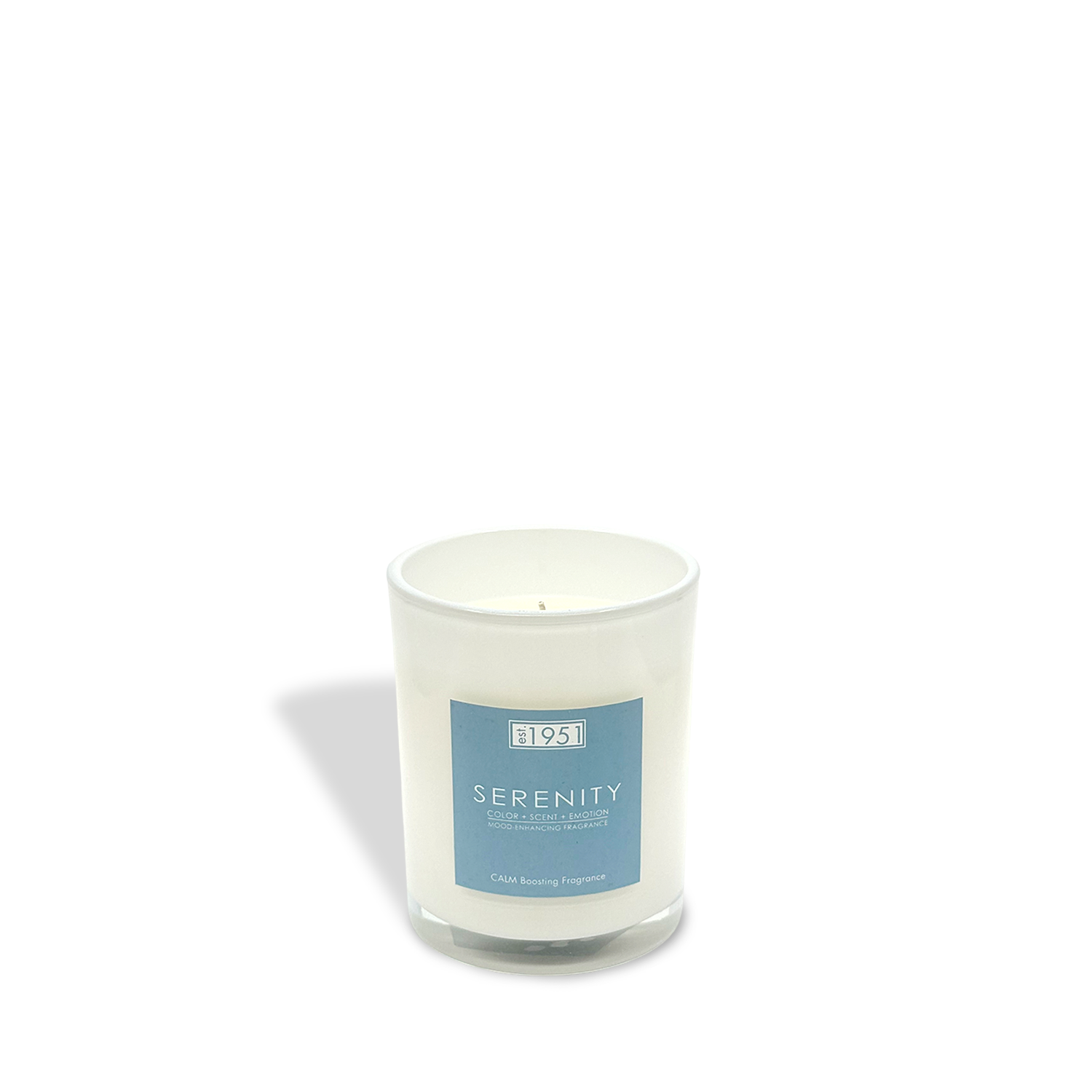 The est.1951 "Serenity" 8oz sea salt candle features white glass and a blue and white label, shown on a white background with a subtle shadow—ideal for relaxation and aromatherapy.