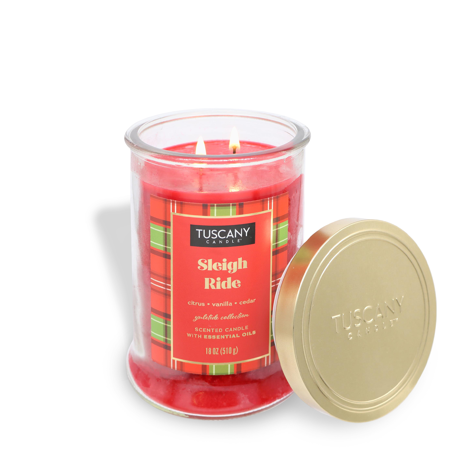 A red "Sleigh Ride" candle from the Tuscany Candle® SEASONAL Winter Flannels Collection, with an open gold lid beside it.