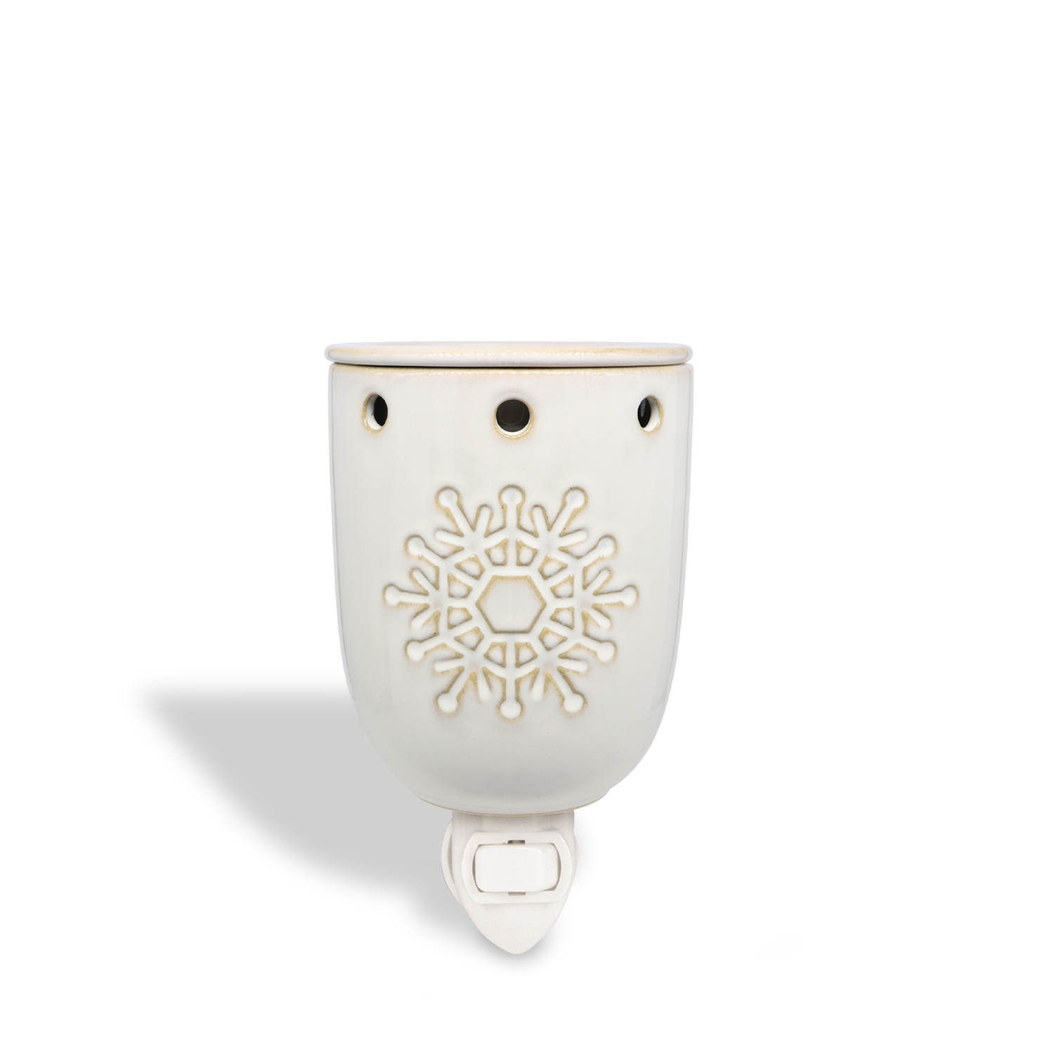 The Snowflake Outlet Wax Melt Warmer by Tuscany Candle® SEASONAL is a white ceramic wall plug-in featuring a snowflake design and a power switch below.