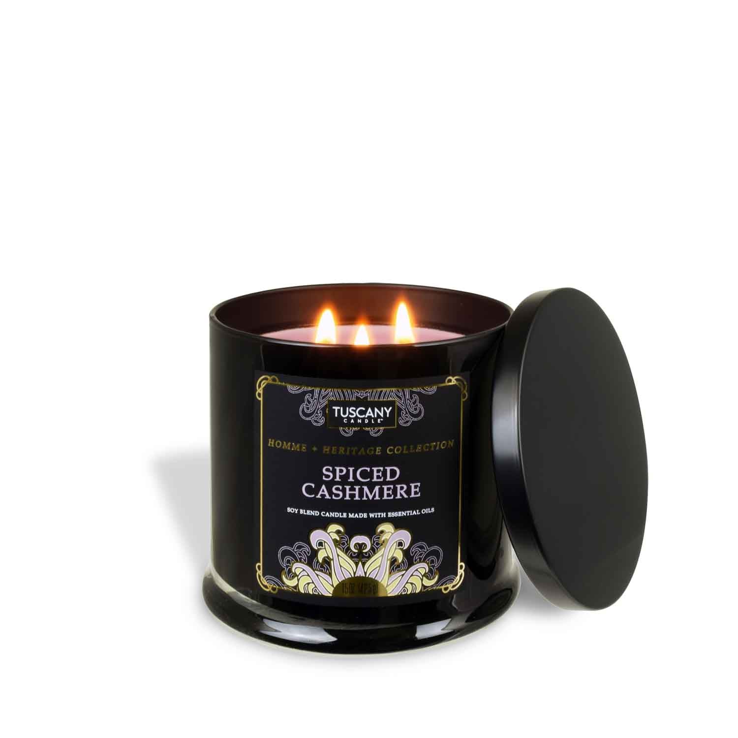 An elegant Spiced Cashmere Scented Jar Candle (15 oz) – Homme + Heritage Collection by Tuscany Candle in a black tin, exuding masculinity, set against a pristine white background.