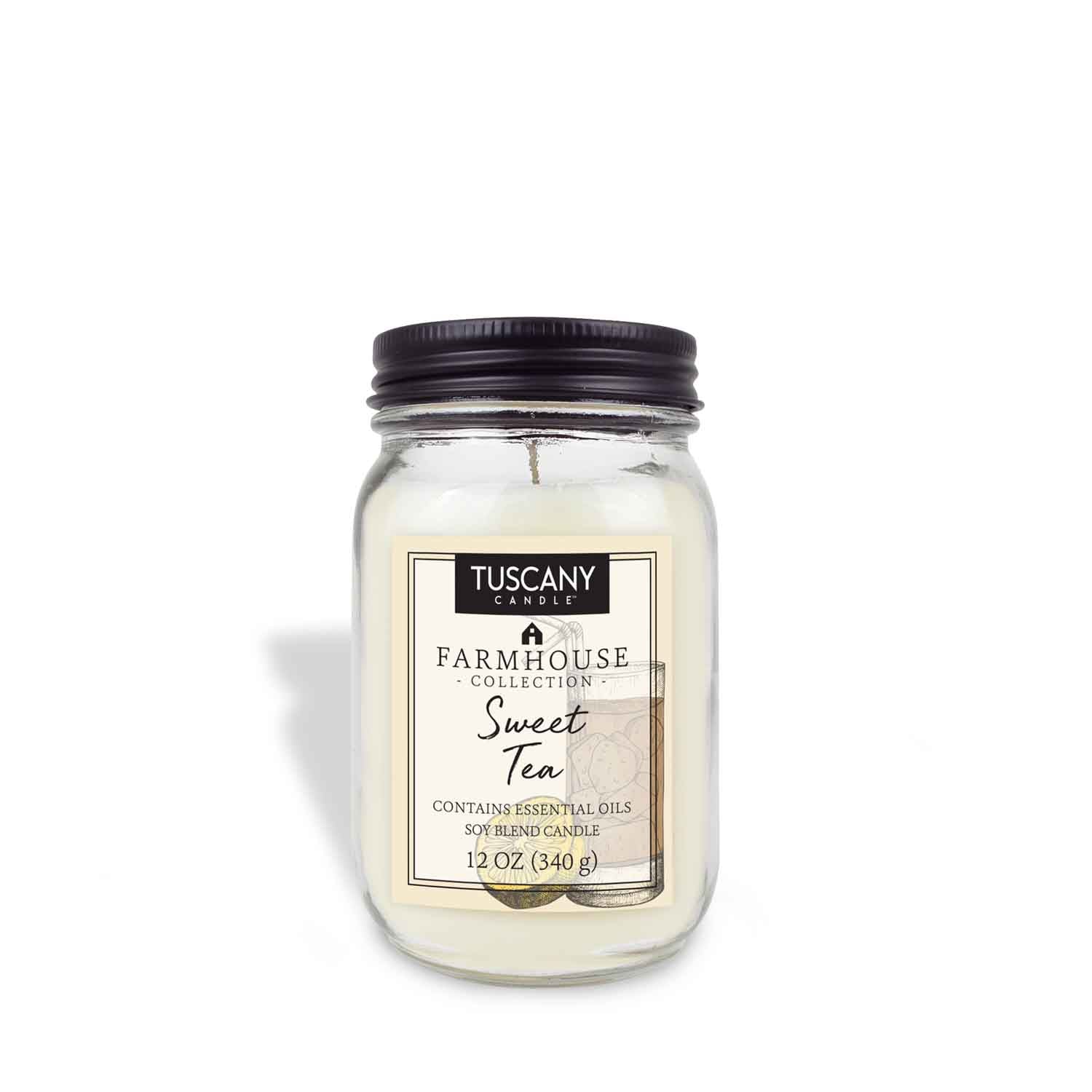 12oz 'Sweet Tea' scented candle in a clear mason jar with a black lid, radiating rustic farmhouse elegance and the heartwarming scent of black tea, sugar, and lemon.
