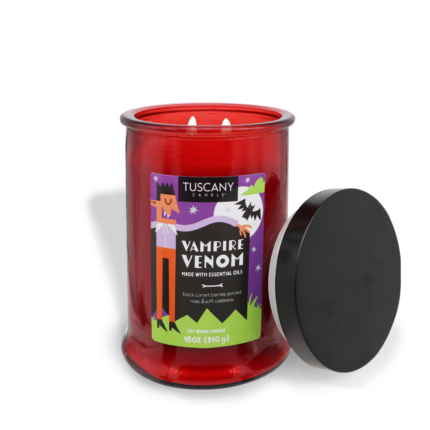 A red Tuscany Candle® SEASONAL labeled "Vampire Venom Long-Lasting Scented Jar Candle (18 oz)" with scents of black currant, berries, spiced rose, and soft cashmere. This limited-run collection candle has an open black lid placed beside it.