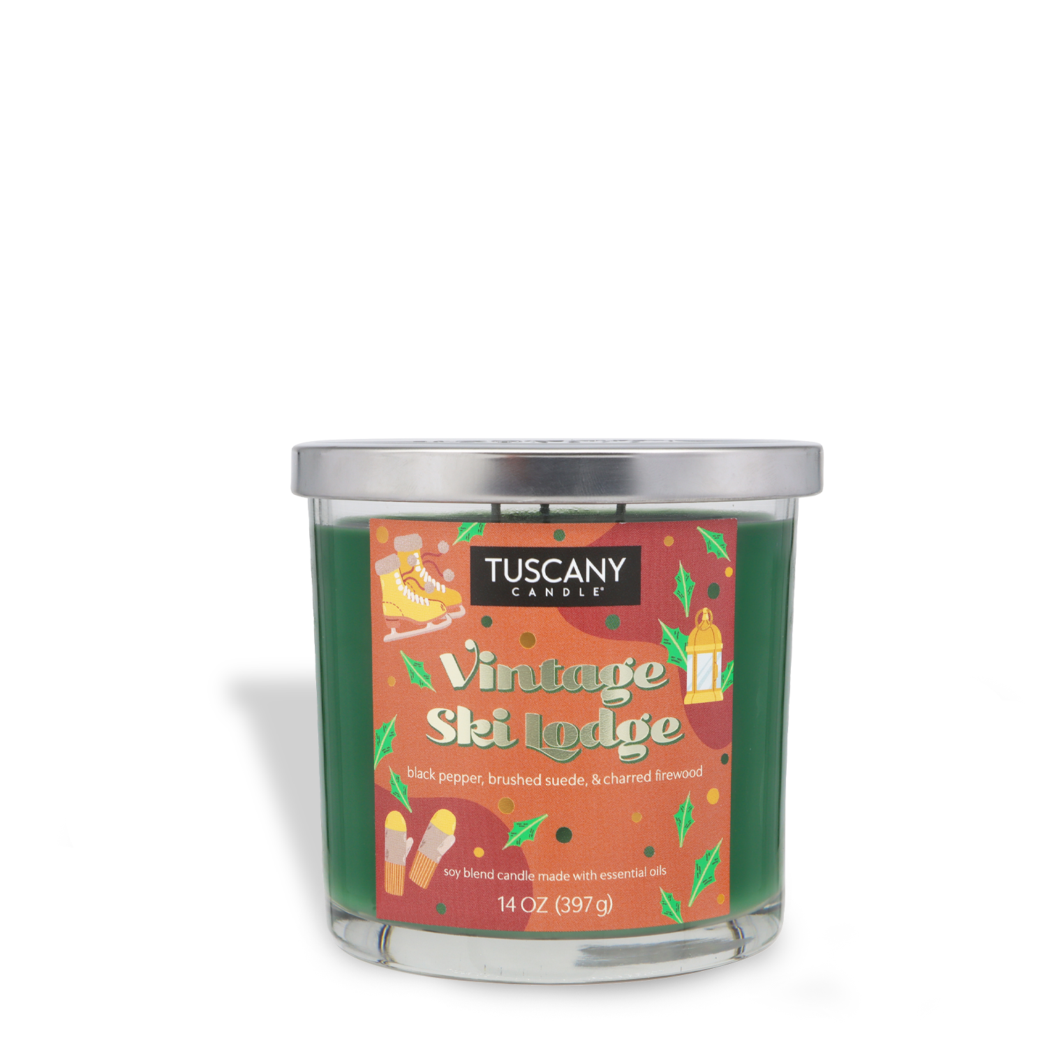 A 14 oz Tuscany Candle® SEASONAL “Vintage Ski Lodge” scented holiday candle featuring ski, boot, and greenery illustrations with a silver lid.