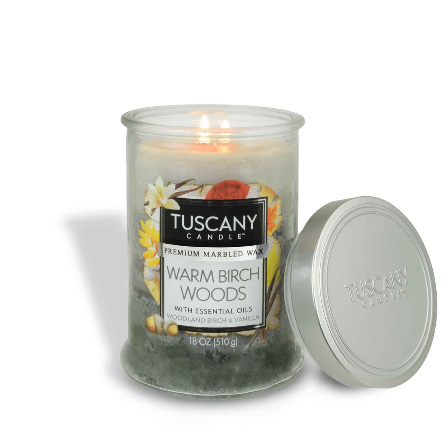 A Warm Birch Woods Long-Lasting Scented Jar Candle (18 oz) by Tuscany Candle with a lid on it.