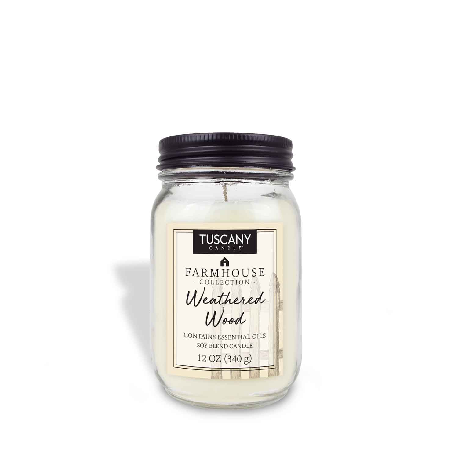 12oz 'Weathered Wood' scented candle in a clear mason jar with a black lid, embodying the rustic farmhouse charm and the comforting scent of sun-washed wood and fresh air.