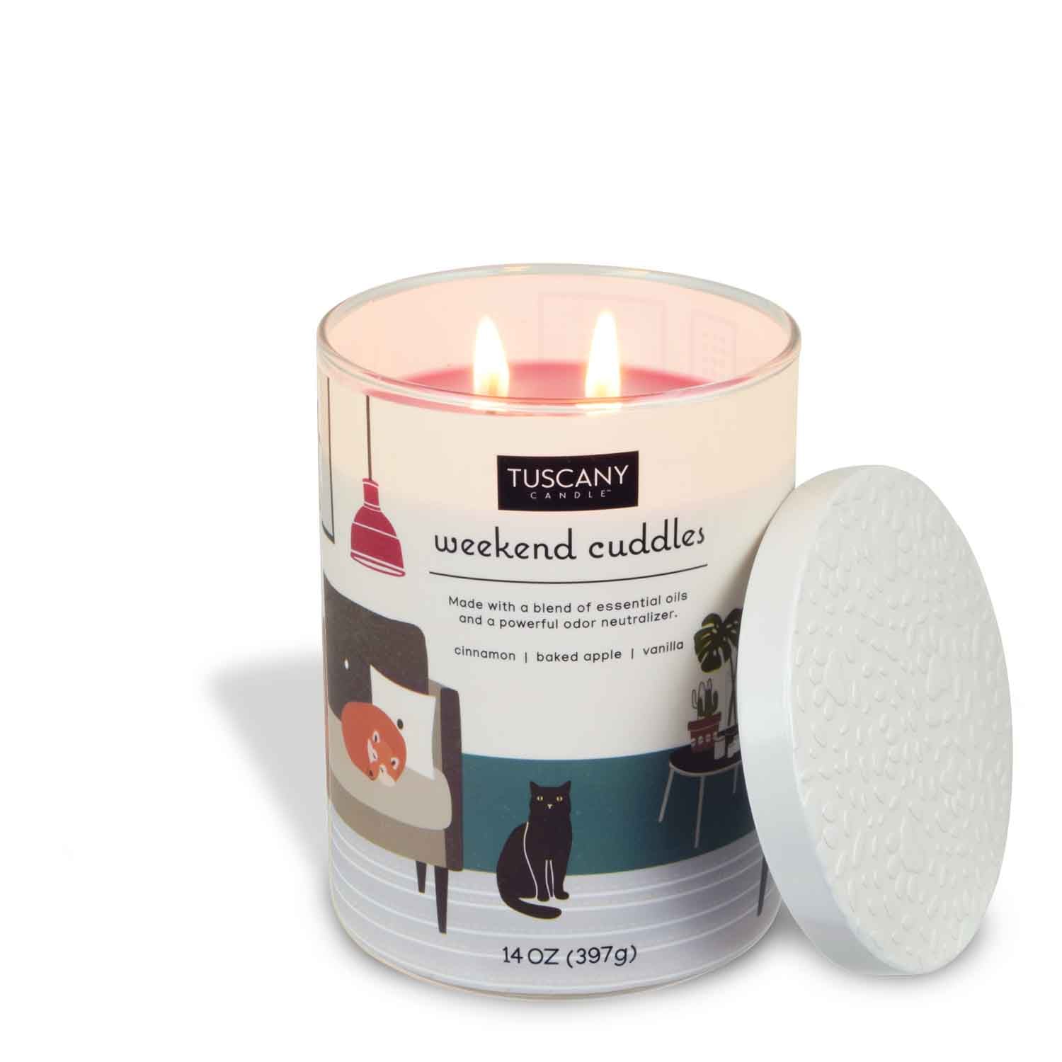 A Weekend Cuddles Scented Jar Candle (14 oz) – Pet Odor Control Collection with a Tuscany Candle sitting on top of it.
