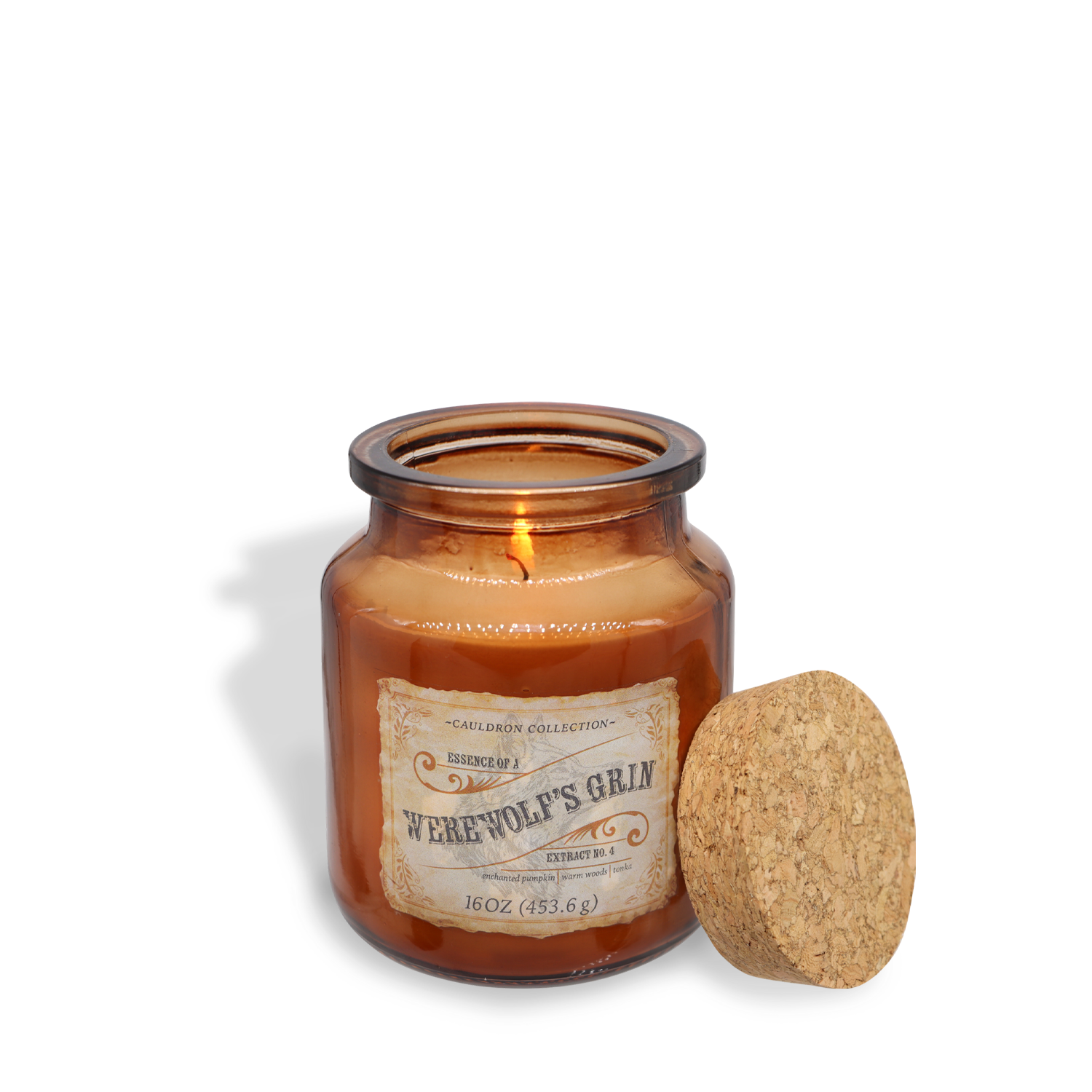 A lit brown glass candle labeled "Essence Of A Werewolf's Grin Long-Lasting Scented Jar Candle (18 oz) — Apothecary Collection," part of a limited-run collection from Tuscany Candle® SEASONAL, with a cork lid placed next to it. This scented candle features essential oils for an enchanting aroma.