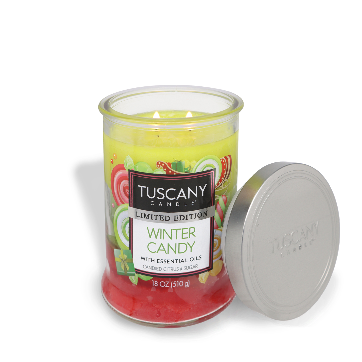 Introducing the Tuscany Candle® SEASONAL, presenting a limited edition "Winter Candy" long-lasting scented jar candle infused with essential oils, candied citrus, and sugar. This delightful candle comes in an 18 oz (510g) glass jar with the lid placed beside it.