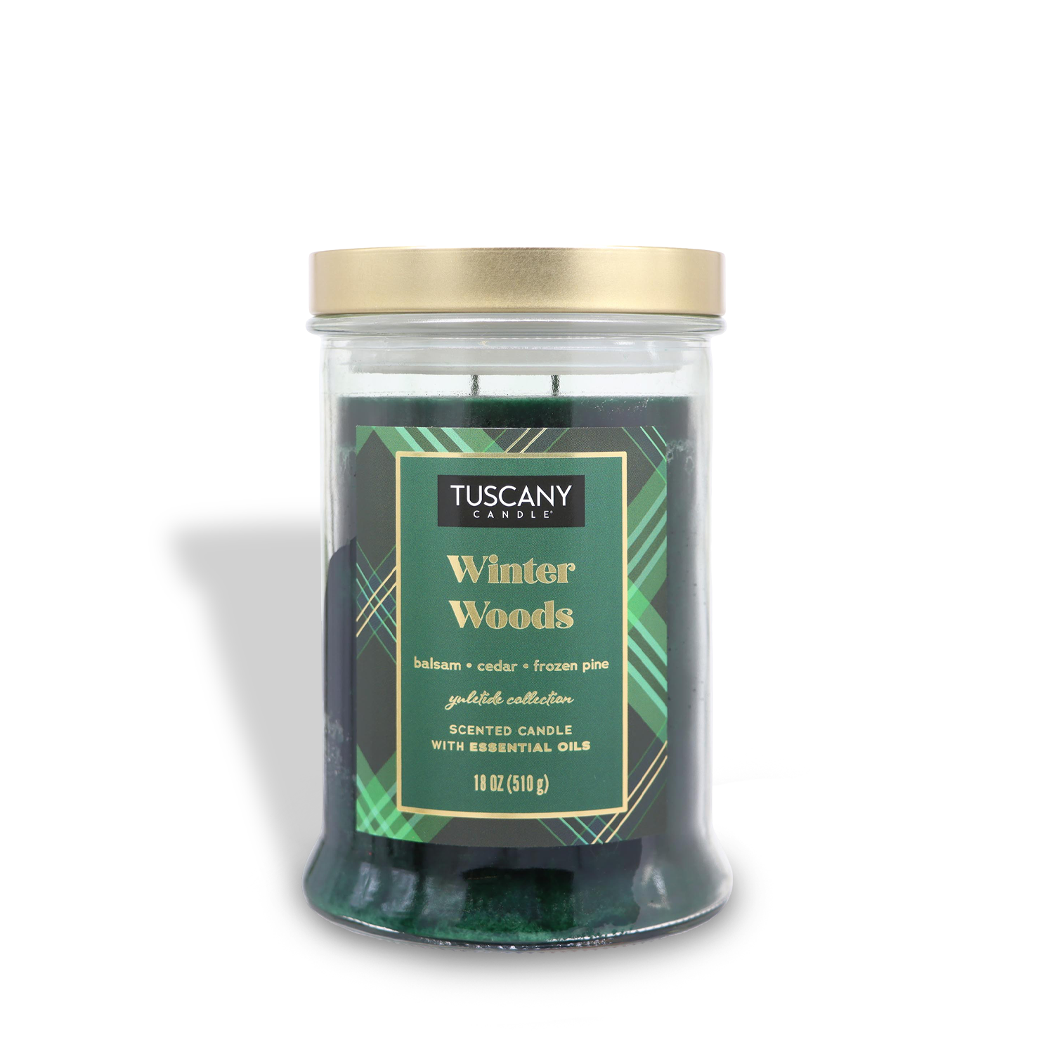 A green "Winter Woods" scented jar candle from the Winter Flannels Collection by Tuscany Candle® SEASONAL, featuring a blend of balsam, cedar, and frozen pine, comes in an 18 oz glass jar with a gold lid.