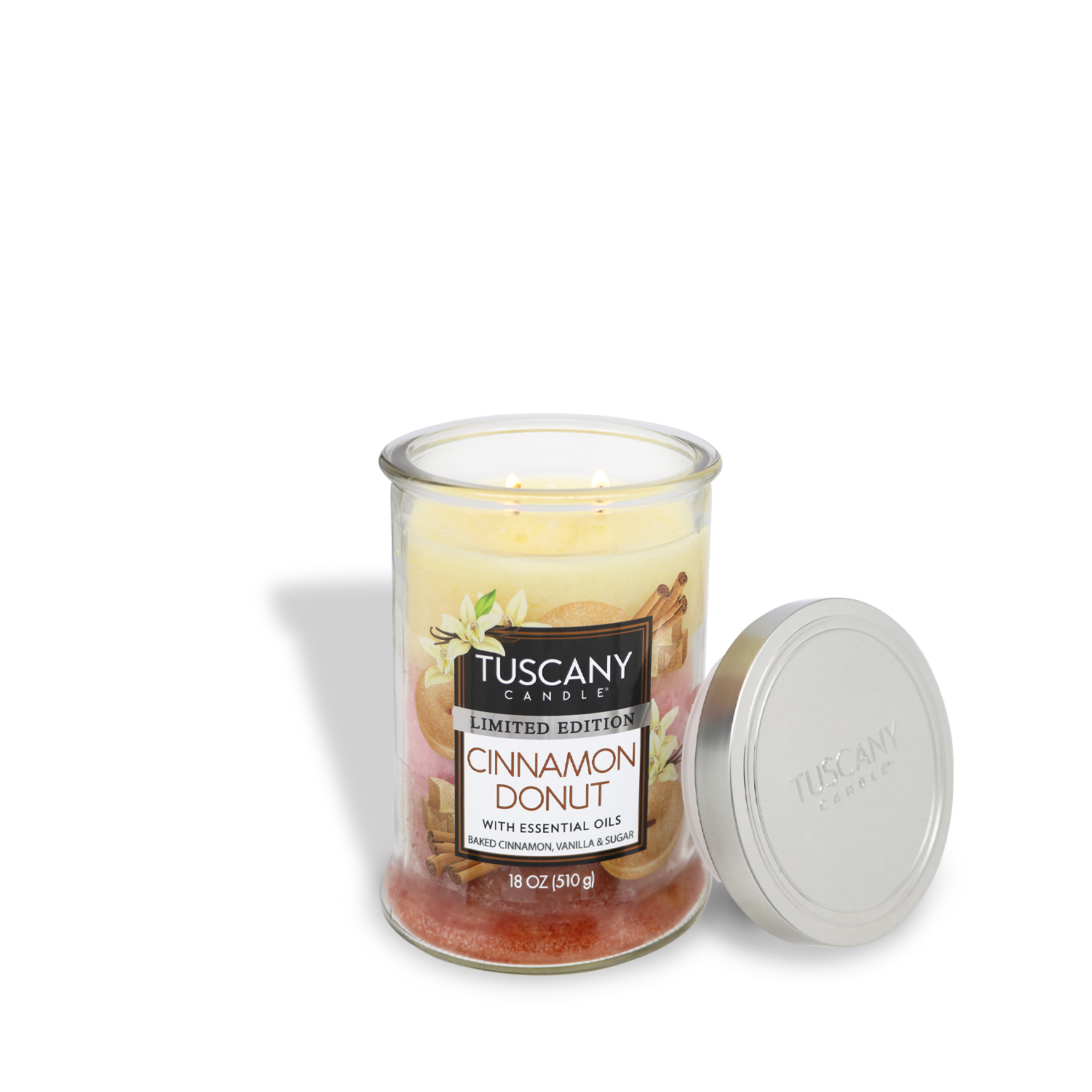 A Tuscany Candle® SEASONAL "Cinnamon Donut: Cinnamon & Sugar Scented Spring Candle" with its lid off. This limited edition candle is 18 oz and infused with essential oils.