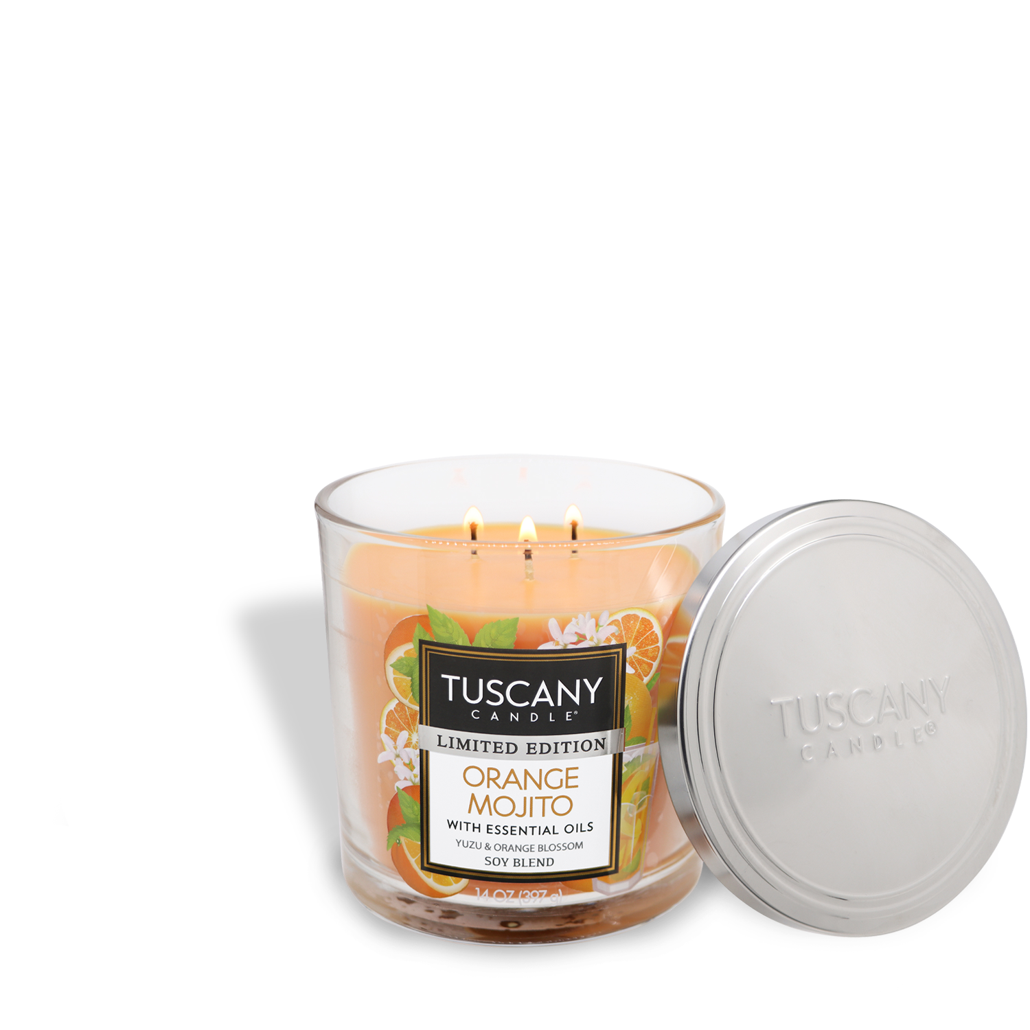 The Tuscany Candle® SEASONAL Orange Mojito: Bergamot & Yuzu Scented Spring Candle (14 oz) is a three-wick candle in a clear glass jar with the lid placed beside it.