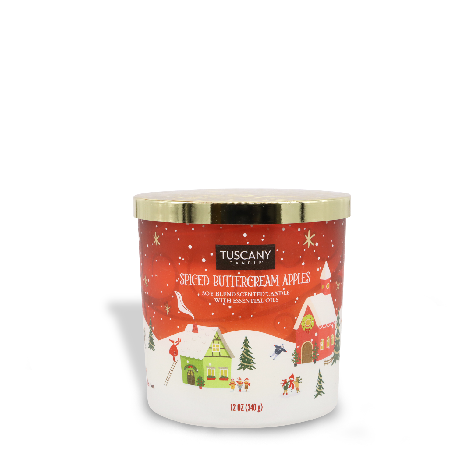 A Spiced Buttercream Apples Scented Jar Candle (12 oz) from Tuscany Candle® SEASONAL, contained in a jar with a gold lid and adorned with a festive holiday design that includes snow-covered houses and Christmas trees.