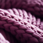 Load image into Gallery viewer, A close up photo of knit cashmere wool - this gentle fragrance is one of the key notes in &quot;Spiced Casmere&quot;, a unisex scented candle from Tuscany Candle&#39;s &quot;Homme &amp; Heritage&quot; collection of scented candles
